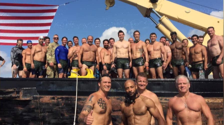 34 current and former Navy SEALs participate in Navy SEAL Hudson River Swim and Run