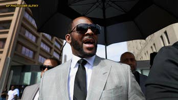 R. Kelly charged with soliciting a minor in Minnesota