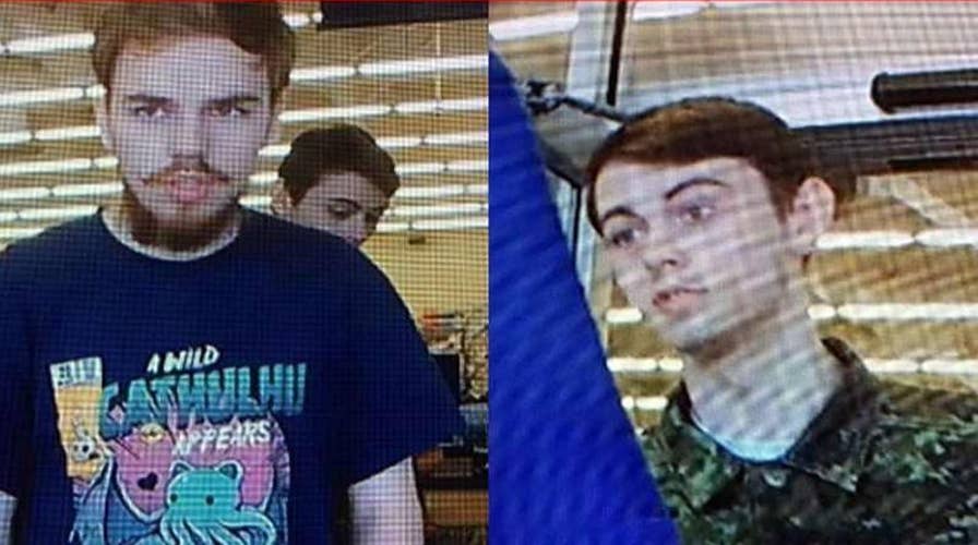 Canadian police end underwater search for teen murder suspects