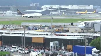 Hong Kong protesters ground flights at one of world's busiest airports