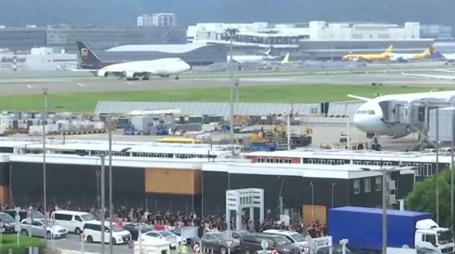 Hong Kong protesters ground flights at one of world's busiest airports