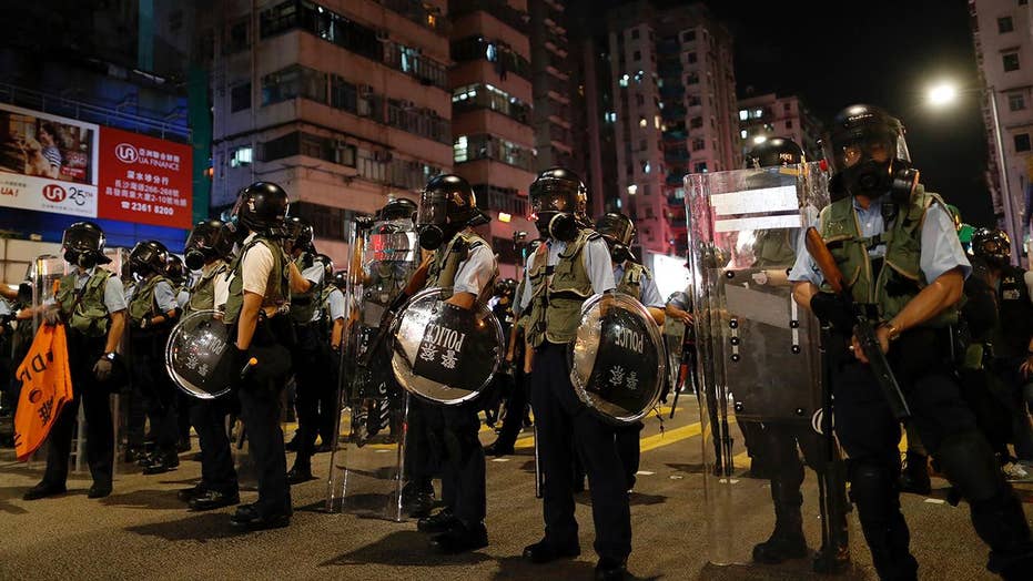 Chinese diplomat warns Beijing ‘will not sit on its hands’; military runs drills near Hong Kong border Chinese diplomat warns Beijing ‘will not sit on its hands’; military runs drills near Hong Kong border