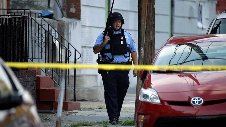Eight-hour standoff in Philadelphia leaves six officers wounded