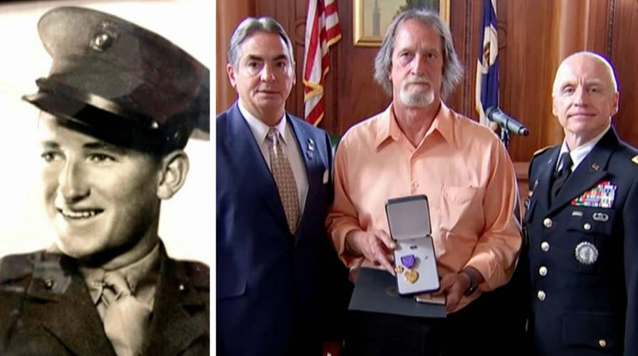 Raw video: Family of fallen Marine presented with Medal of Liberty 77 years after his death