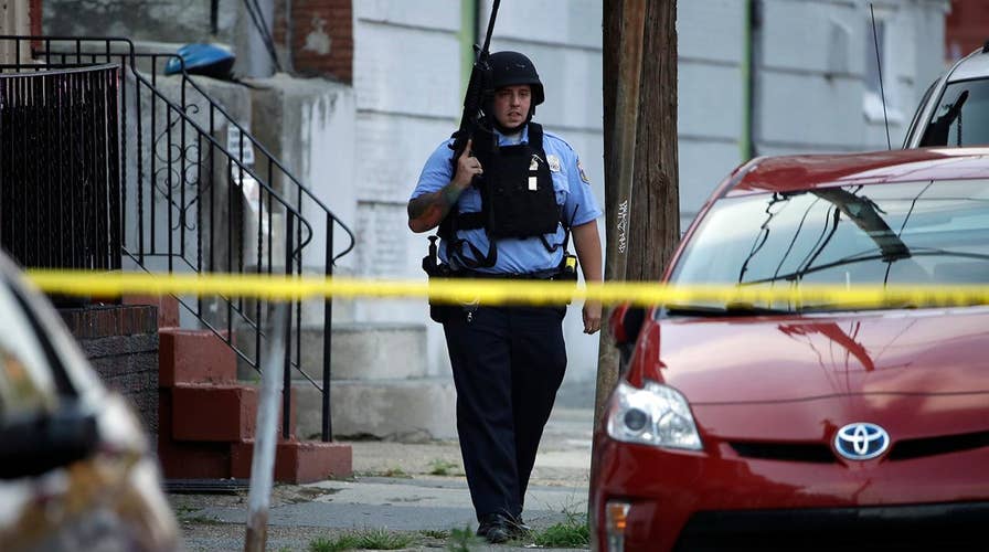 Eight-hour standoff in Philadelphia leaves six officers wounded