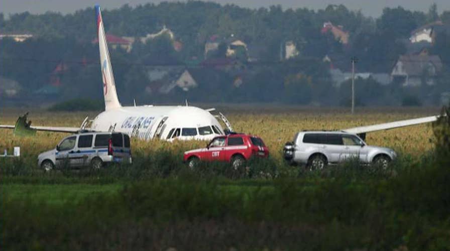 Russian pilots make emergency landing in cornfield