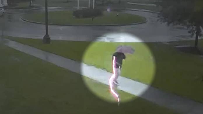 Lightning too close for comfort during school counselor's campus walk in shocking video