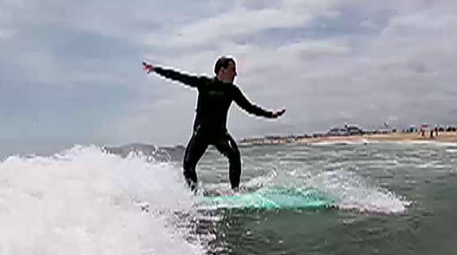 Todd and Griff hit the waves with the team from Summertime Surf