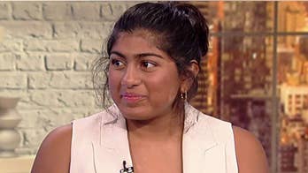 Teen swims 28 miles around Manhattan for charity