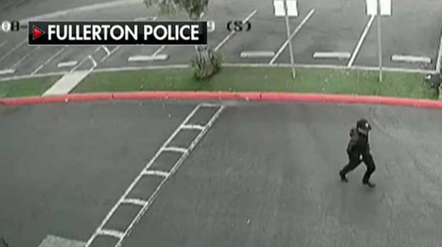 Police release video of suspected killer in campus stabbing of former university official
