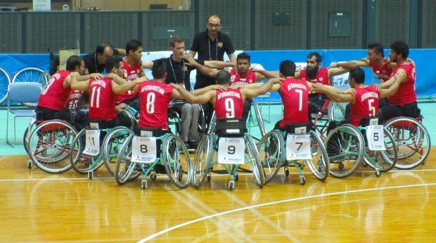 Pro athletes unite bring wheelchair basketball to people trapped in war