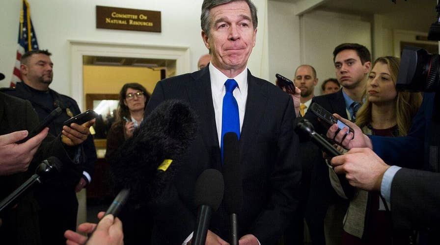 North Carolina Gov. Roy Cooper vetoes bill to require state and local police cooperate with ICE