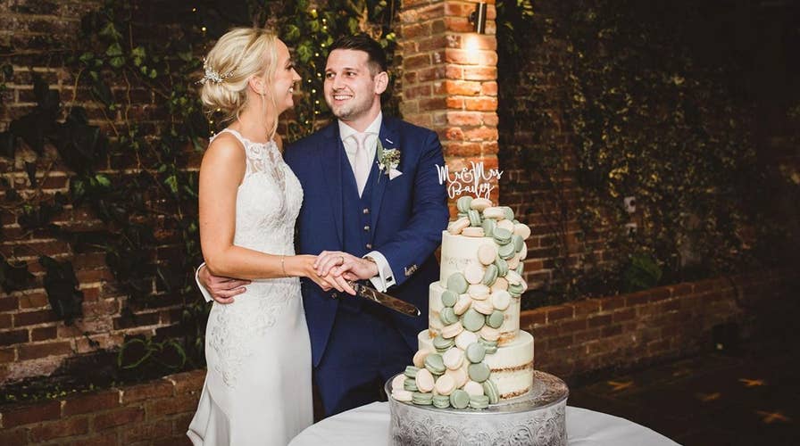 Exact moment of couple's wedding cake disaster caught on camera: 'It felt like slow motion'