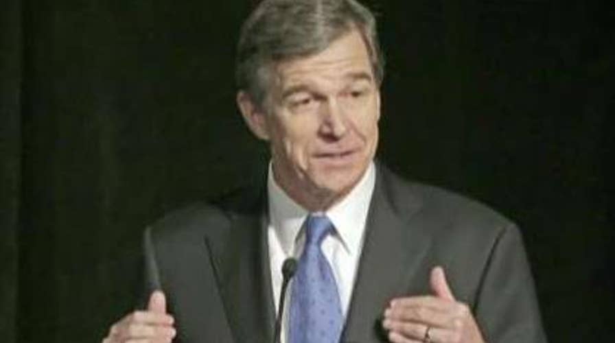 North Carolina governor vetoes bill that would have required sheriffs to cooperate with ICE