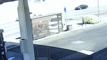 Woman in wheelchair narrowly escapes danger as car slams into Phoenix bus stop