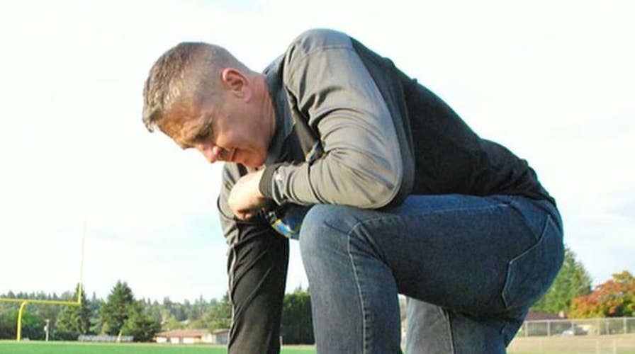 Football coach fired for defying school prayer ban says fight is far from over