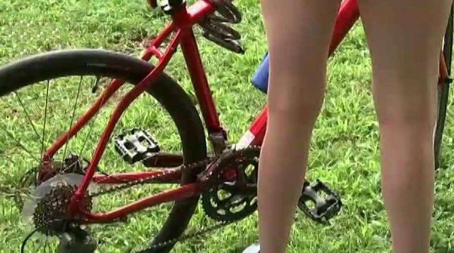 Exhibitionists take part in a naked bike ride through Philadelphia