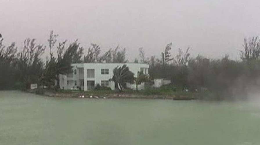Woman riding out Hurricane Dorian says most areas of Grand Bahama are under water