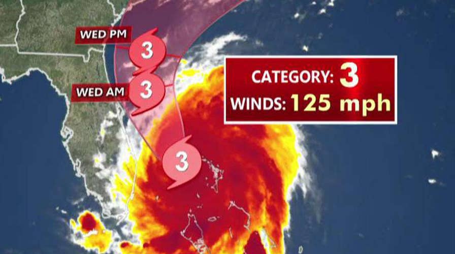 Hurricane Dorian weakens to Category 3 storm as it slows to a crawl over the Bahamas