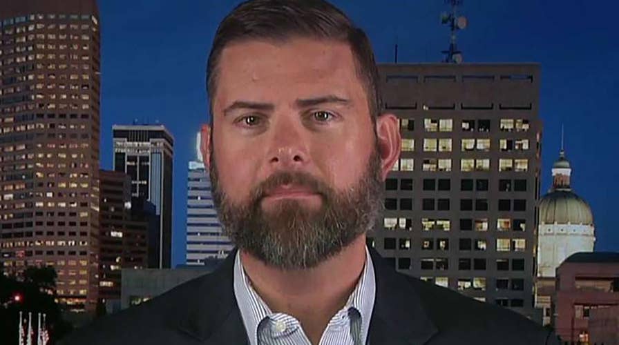 Man puts together photo book honoring law enforcement after 800 day trip around the world