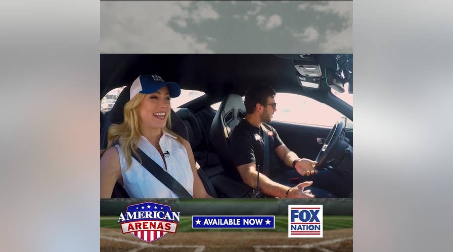 Behind the scenes: Fox Nation's Abby Hornacek spotted at Talledega with 'Elvis twins'
