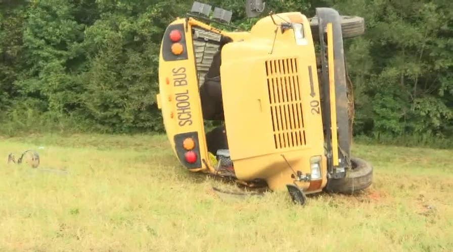 Driver dead in school bus crash, 4 children airlifted from scene: reports