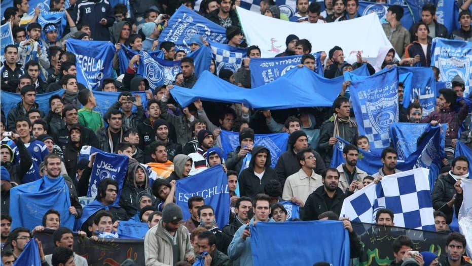 Iranian female soccer fan 'blue girl' dies after setting herself on fire