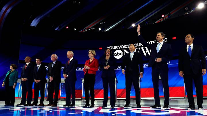 Democratic presidential candidates debate who will best keep Obama's legacy