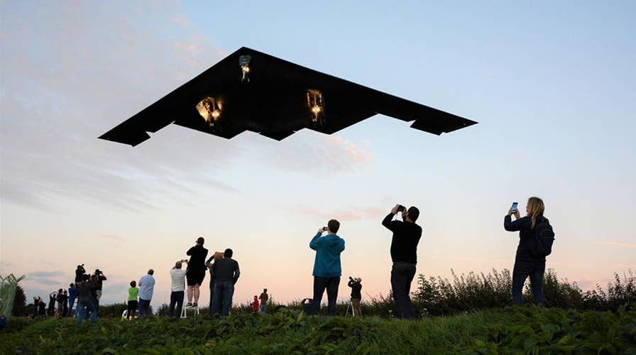 B-2 stealth bomber flies just 60 feet above impressed plane spotters' heads