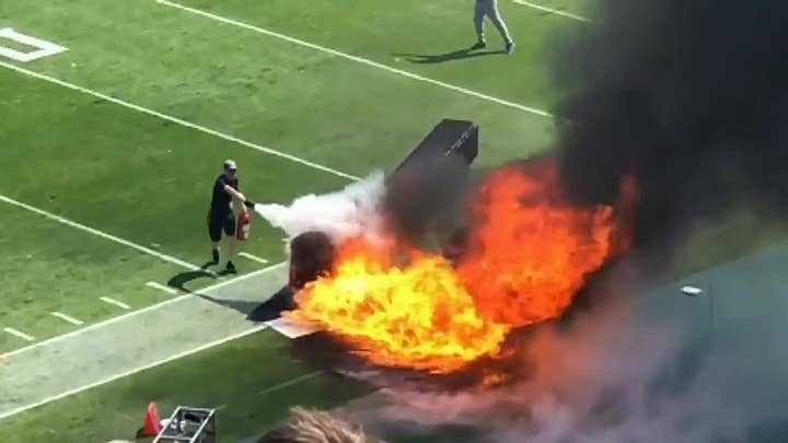 Fire sparks during Titans' pregame ceremony for their home opener at Nissan Stadium in Nashville, Tennessee on Sunday.