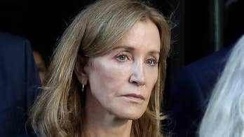 Felicity Huffman seen in green jumpsuit at California prison