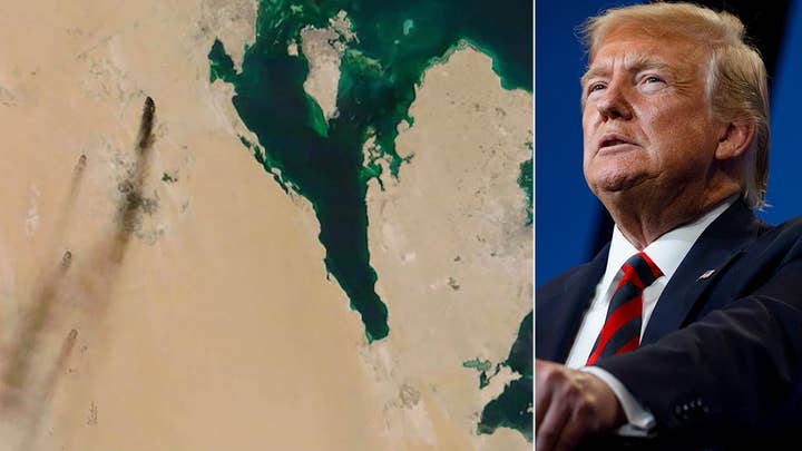 Trumps warns US is 'locked and loaded' after attack on Saudi oil supply