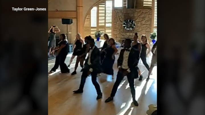 Couple surprises wedding guests with secret flash mob dance routine: 'There was a lot of cheering'