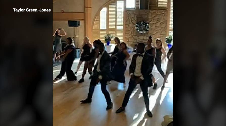 Couple surprises wedding guests with secret flash mob dance routine: 'There was a lot of cheering'