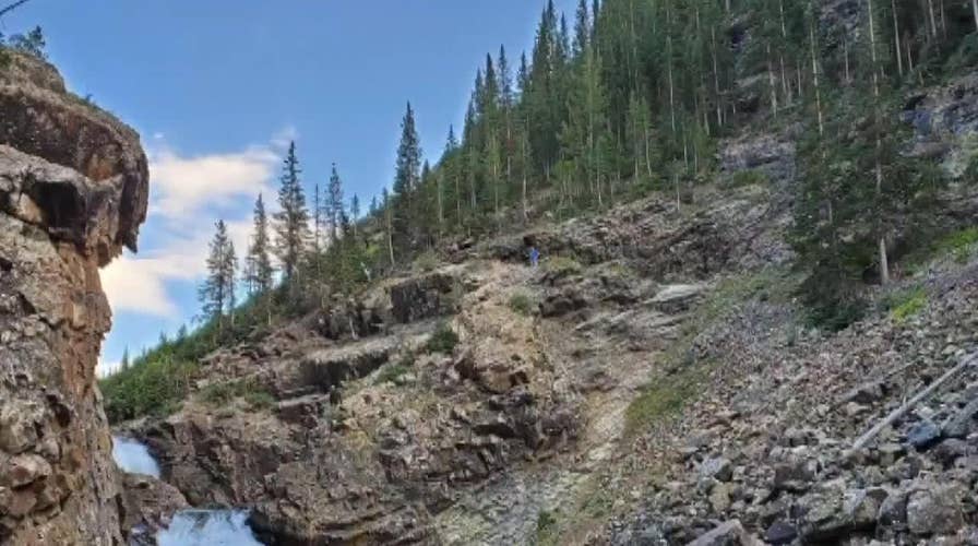 Motorcyclist falls off Colorado cliff, survives