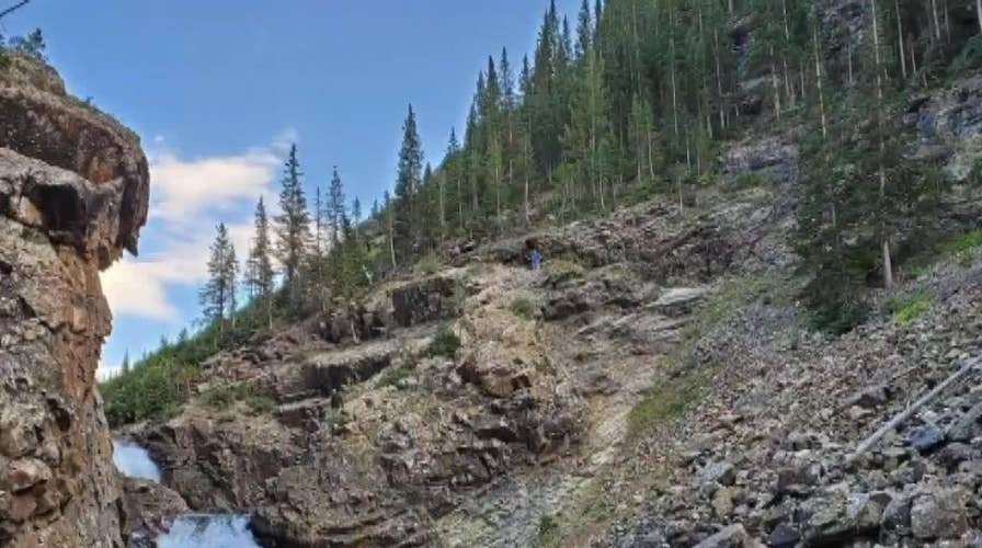 Motorcyclist falls off Colorado cliff, survives