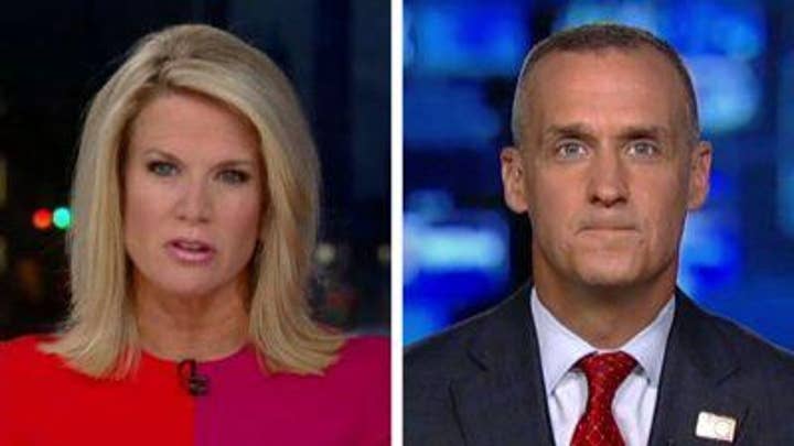 Corey Lewandowski reacts to hearing