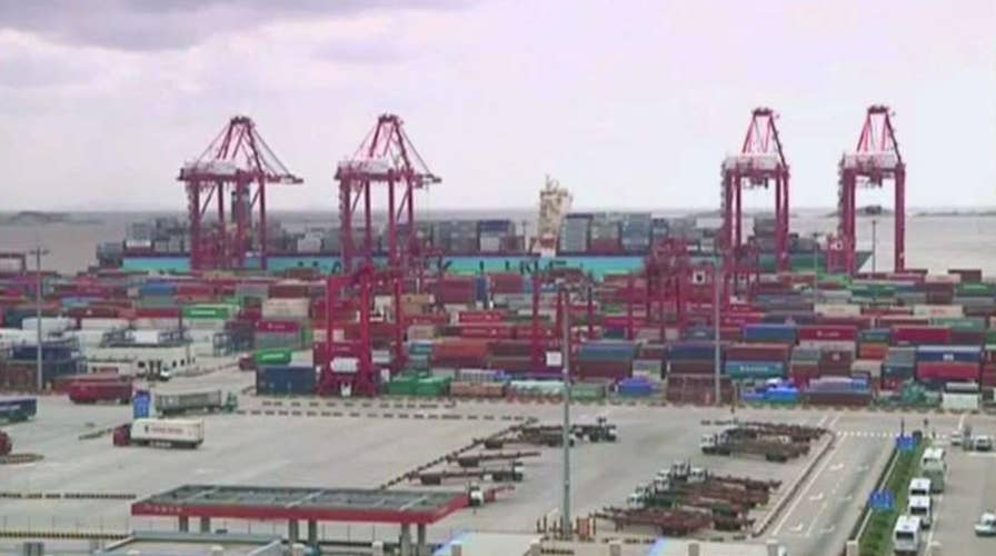 Federal Reserve cuts benchmark interest rate by a quarter-point