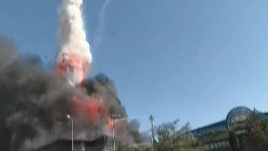 Turkey chemical factory explosion launches metal tank into sky above fleeing onlookers, video shows