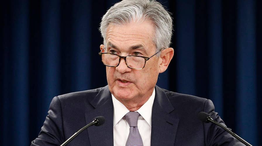 Federal Reserve cuts interest rates amid fears of a global slowdown