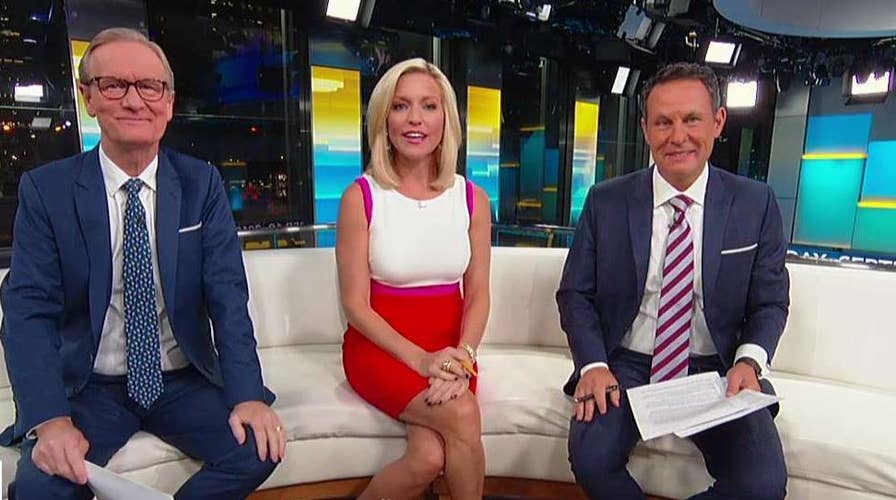 Trump praises wall progress as he tours southern border