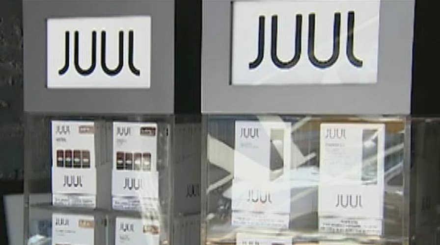 Juul suspends US ads, CEO quits