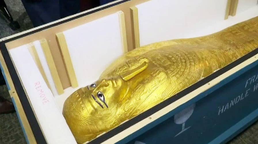 Centuries-old golden coffin is returned to its rightful owners