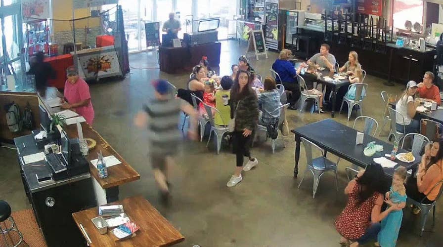 Brave barista tackles would-be thief