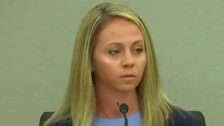 Former Dallas police officer Amber Guyger breaks down on the stand