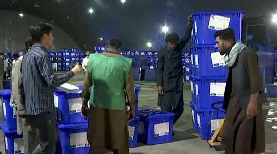 Afghanistan deploys more than 100,000 troops to guard polling stations