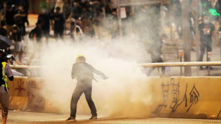 Hong Kong police use tear gas, water cannons to disperse demonstrators