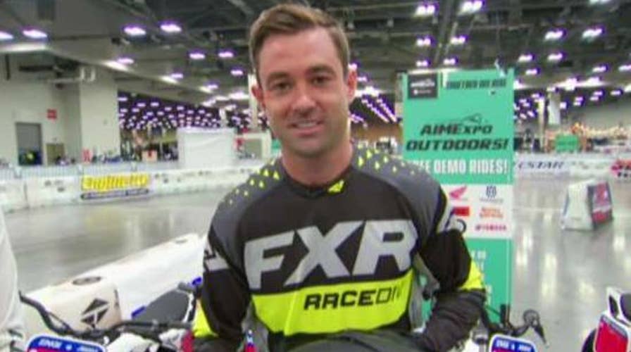 Adam Klotz tests out an electric motorcycle before 'The Good Ride'