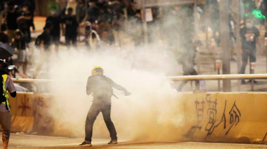 Hong Kong police use tear gas, water cannons to disperse demonstrators