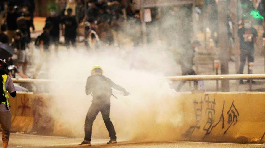 Hong Kong police use tear gas, water cannons to disperse demonstrators